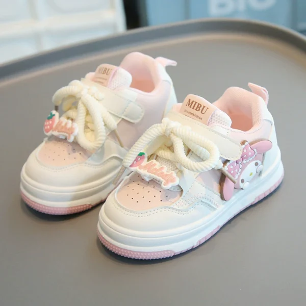 Adorable pink & purple baby sneakers with cartoon character design, soft sole, and stylish laces for little girls.