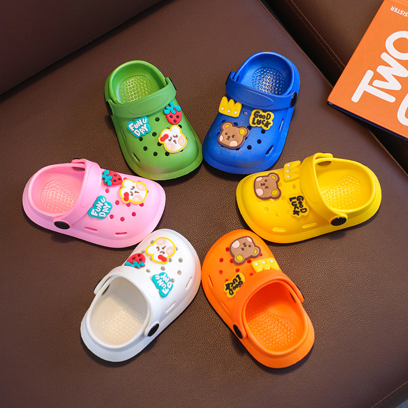 Colorful cartoon-themed slippers for kids with breathable design and secure strap​.