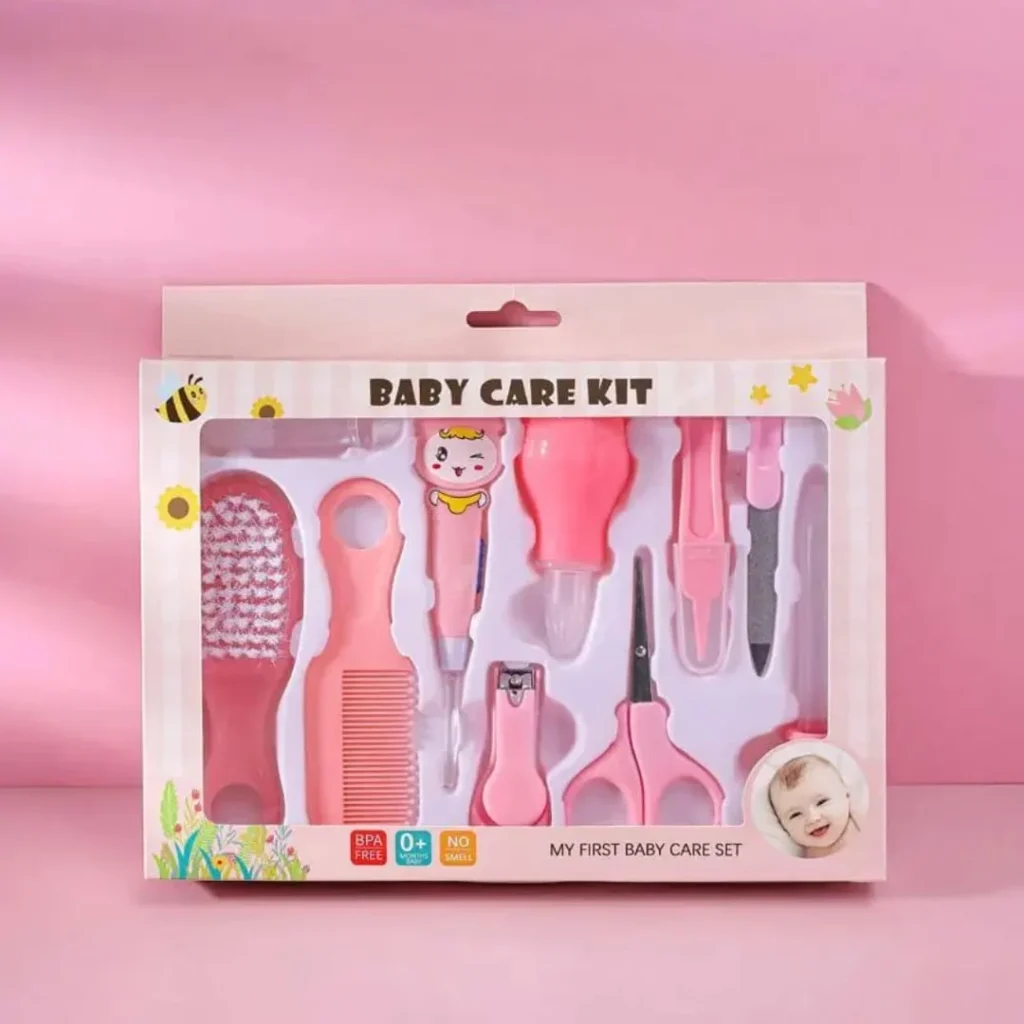 Pink Baby Care Kit with baby nail cutter, comb, scissors, brush and grooming accessories for newborn babies