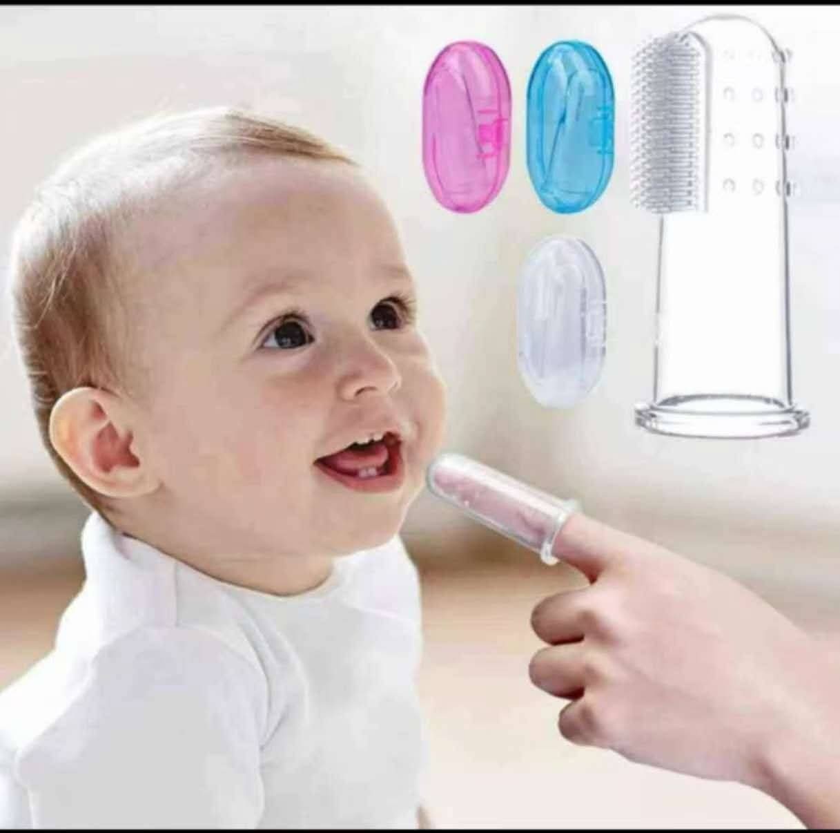 Baby finger toothbrush made from BPA-free food-grade silicone with soft bristles and protective storage case for cleaning newborn teeth, gums, and tongue.